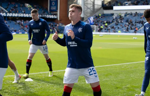 Charlie McCann warming up at Ibrox