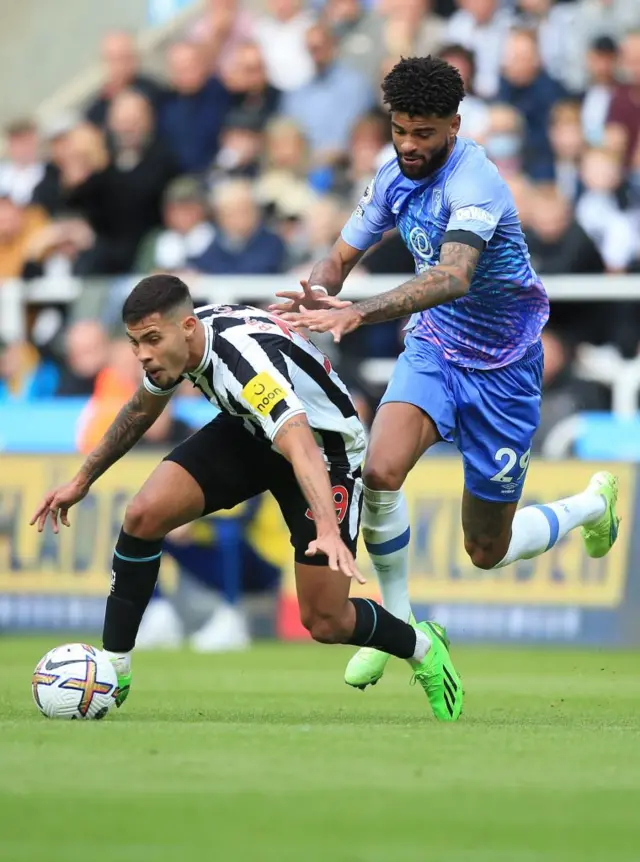 Bruno Guimaraes (L) and Bournemouth's Danish midfielder Philip Billing