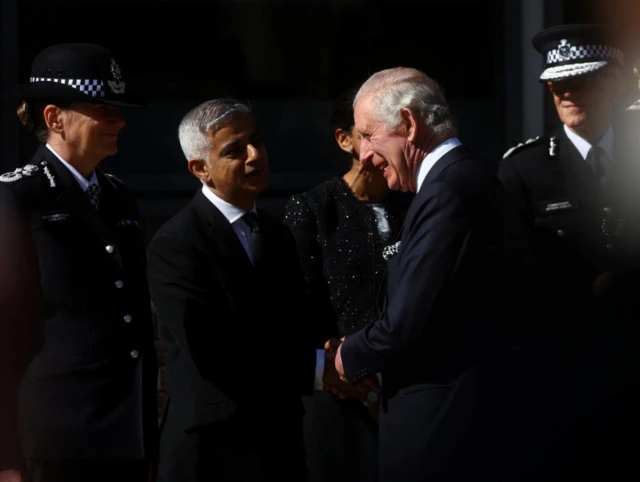 King Charles shakes hands with London Mayor Sadiq Khan