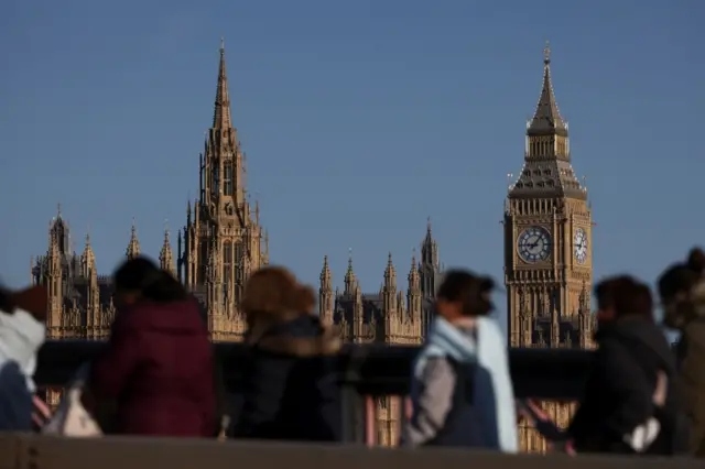 The queue on Lambeth Bridge, with the Palace of Westminster in the background