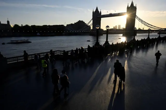 People queue near Tower Bridge, to pay their respects to Britain's Queen Elizabeth