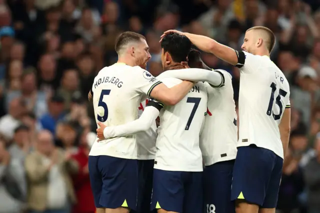 Son Heung-Min celebrates with teammates