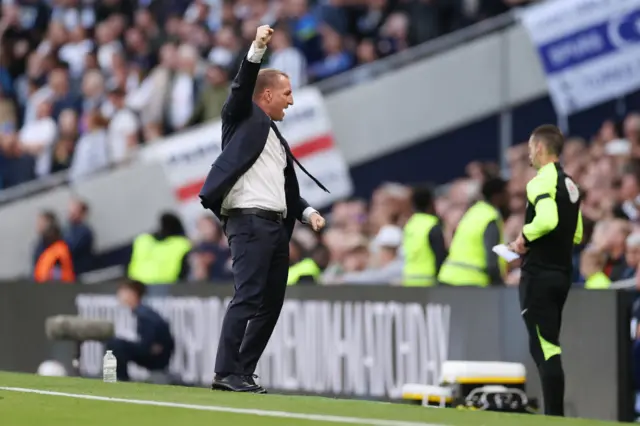 Brendan Rodgers celebrating on the dugout