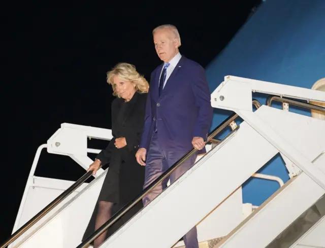 US President Joe Biden and his wife First Lady Jill Biden arrive at Stansted