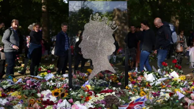 People view floral tributes in Green Park following the death of Britain's Queen Elizabeth, in London, Britain September 18, 2022.