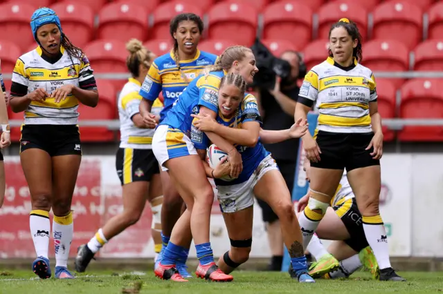 Leeds celebrate Caitlin Beevers' try