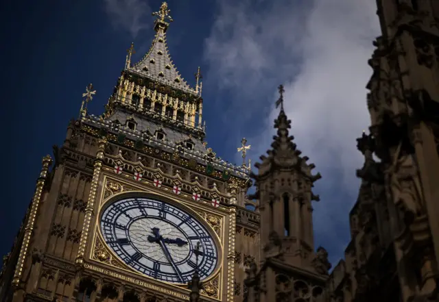 A face of Big Ben, the clock at Palace of Westminster is pictured during a the ceremonial procession of the coffin of Queen Elizabeth II to Westminster Hall in central London on September 14, 2022.