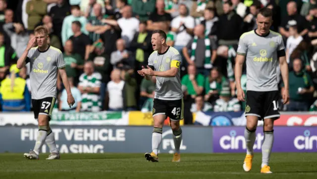 Celtic captain Callum McGregor (centre) tries to rally his side