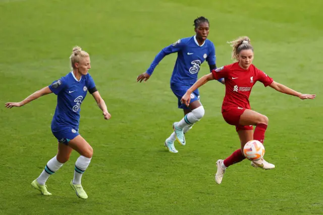 Leanne Kiernan controls the ball whilst under pressure from Kadeisha Buchanan