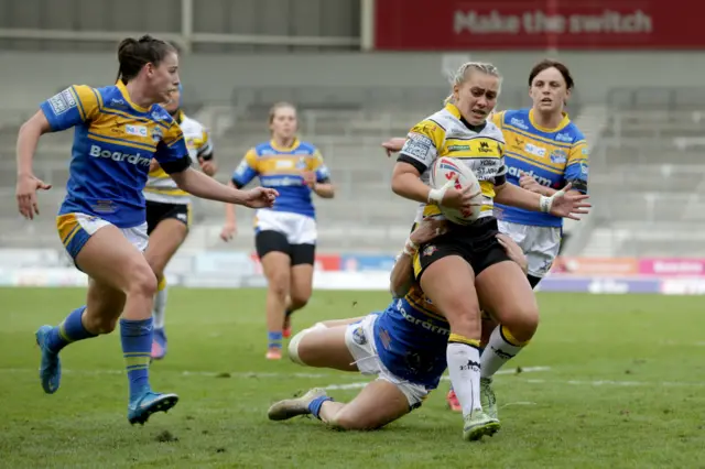 York's Sinead Peach runs with the ball