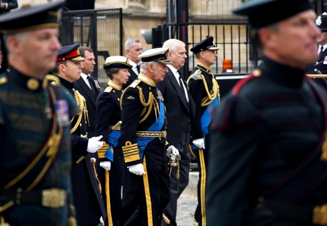 Queen's children follow her coffin