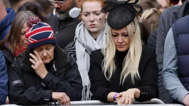 People listen to the service via loudspeakers