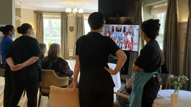 Residents and staff at the Royal Star & Garter – a nursing home in Surbiton for former military personnel.