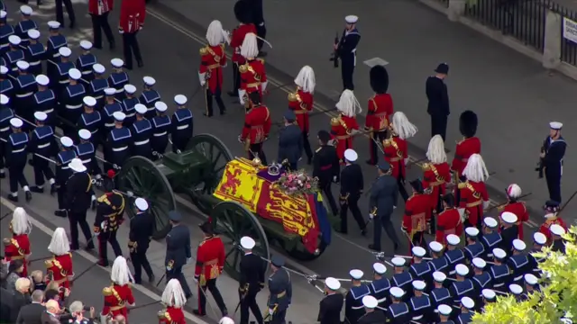 The procession leaves the abbey