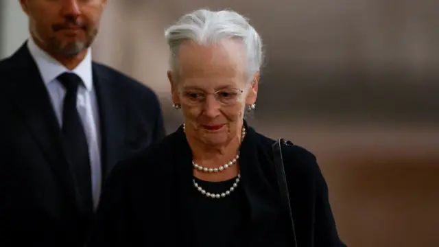 Denmark's Queen Margrethe and Crown Prince Frederik view the coffin of Queen Elizabeth II, lying in state on the catafalque in Westminster Hall, at the Palace of Westminster, London. Picture date: Sunday September 18, 2022