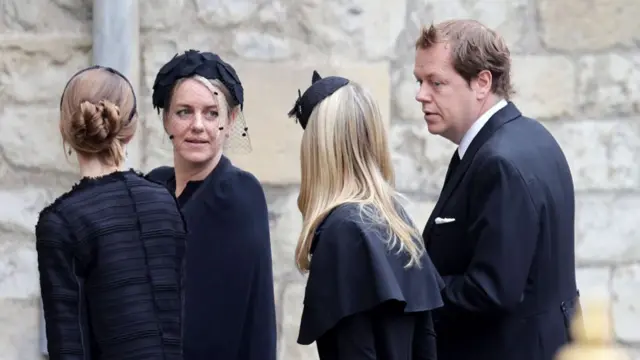 Tom Parker Bowles arrives with his family