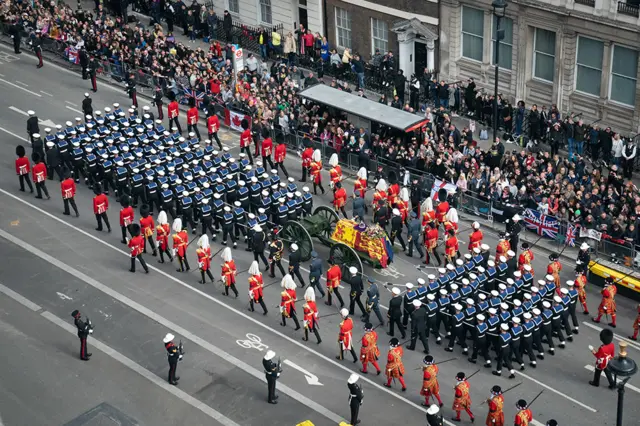 The procession leaves Westminster Abbey