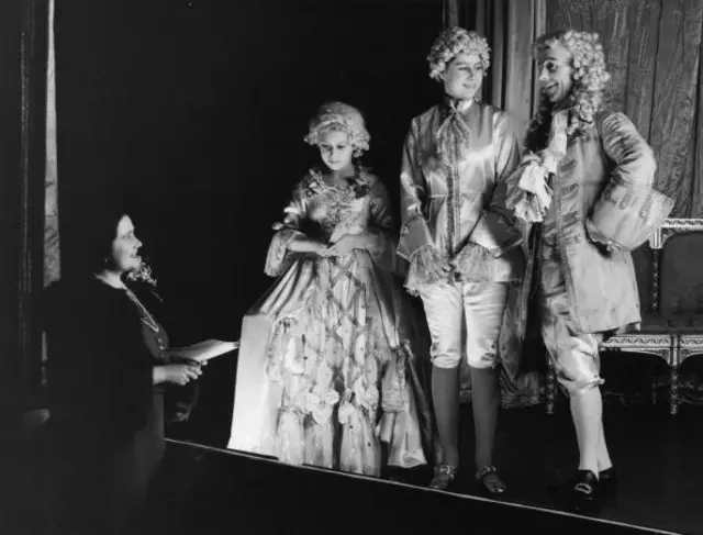 Princesses Elizabeth and Margaret during a rehearsal of Cinderella, the first Royal pantomime at Windsor Castle, in 1941