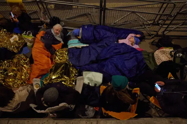 People camp overnight in London ahead of the Queen's funeral.