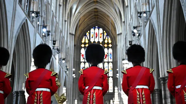 The fanfare team of the household division bands stand in the Abbey