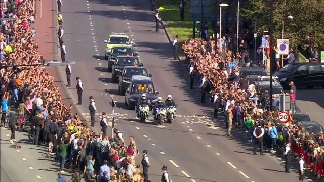 People line the route of the State Hearse as it makes its way from London to Windsor