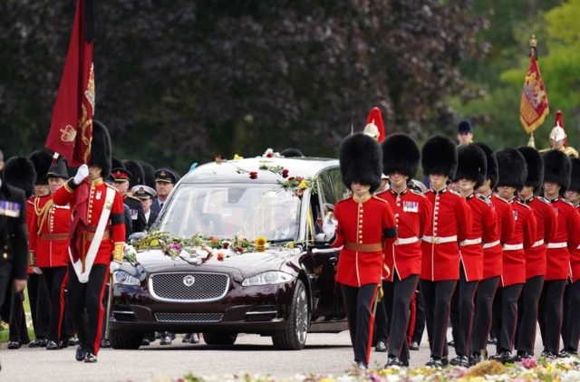 The Ceremonial Procession of the coffin of Queen Elizabeth II arrives at Windsor Castle