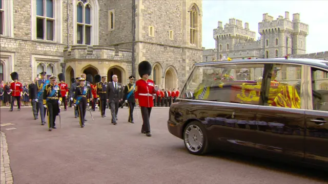 Royal Family and hearse