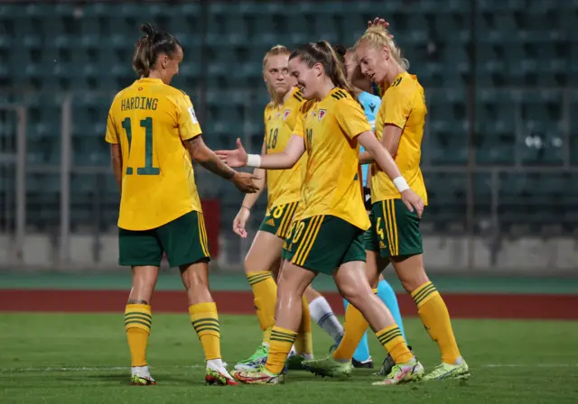 Wales' Carrie Jones celebrates scoring their first goal