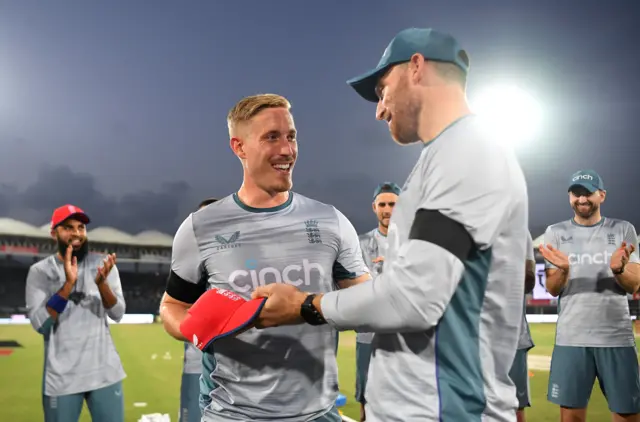 Jos Buttler presents Luke Wood with his T20 cap