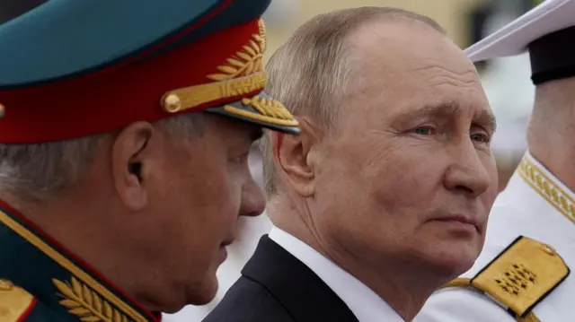 Russia's Defence Minister Sergei Shoigu (left) with President Vladimir Putin