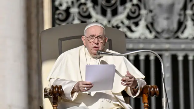 Pope Francis addresses a crowd in his weekly Wednesday General Audience