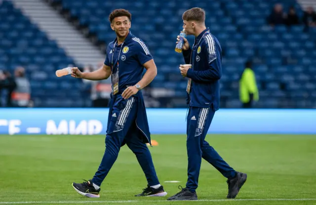 Che Adams, left, aims to add to his five Scotland goals on his 20th apperance