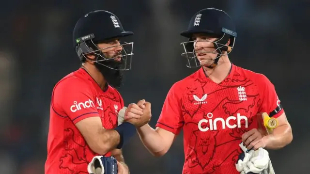 England's Ali and Brook celebrate