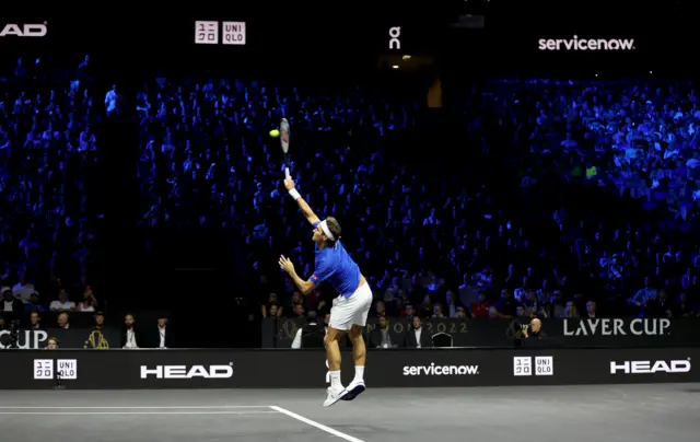 Federer serves