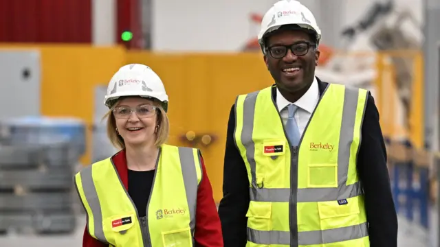 PM Liz Truss and Chancellor Kwasi Kwarteng wear hi-vis jackets and hard hats during a visit to Berkeley Modular in Northfleet Kent this afternoon