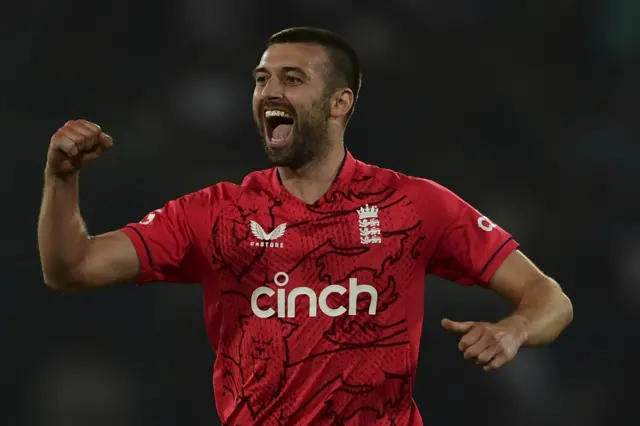 Mark Wood celebrates a wicket in the third T20 v Pakistan in Karachi