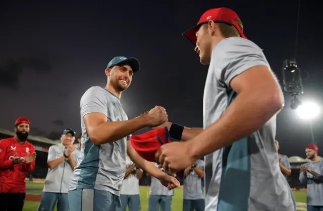 Will Jacks is presented with his first England cap by Sam Curran