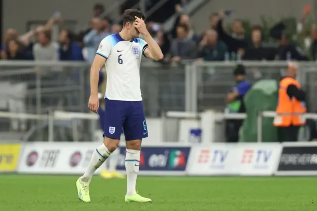 Harry Maguire dejected after conceding the first goal of the match