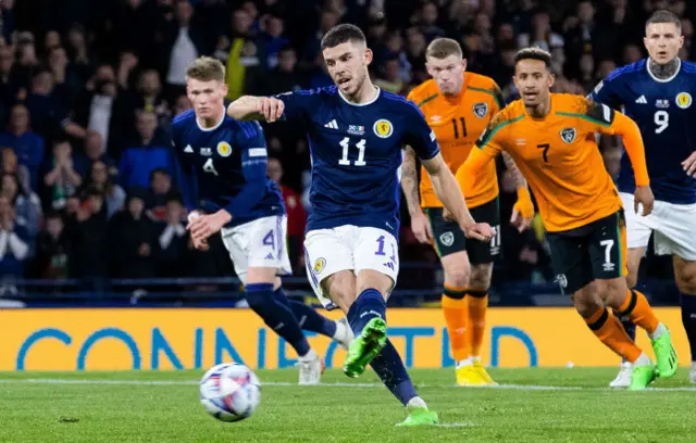 Ryan Christie tucks away a penalty for Scotland