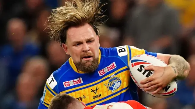 Leeds Rhinos' Blake Austin (centre) is tackled