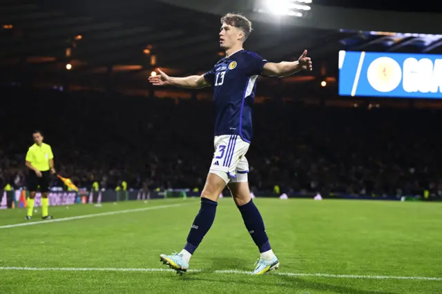 Jack Hendry celebrates his equaliser for Scotland