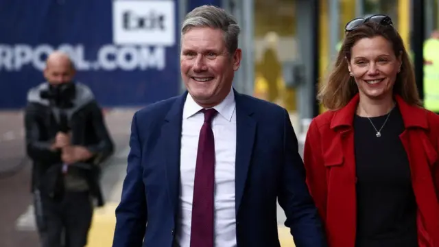 Sir Keir Starmer and his wife Victoria arriving in Liverpool