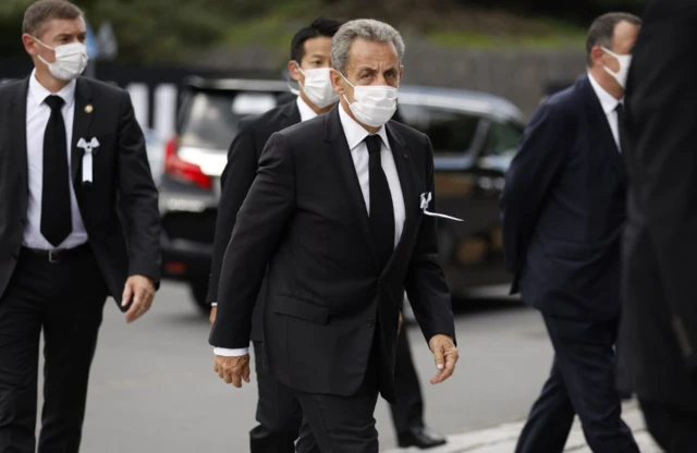 Former French President Nicolas Sarkozy arriving at the ceremony