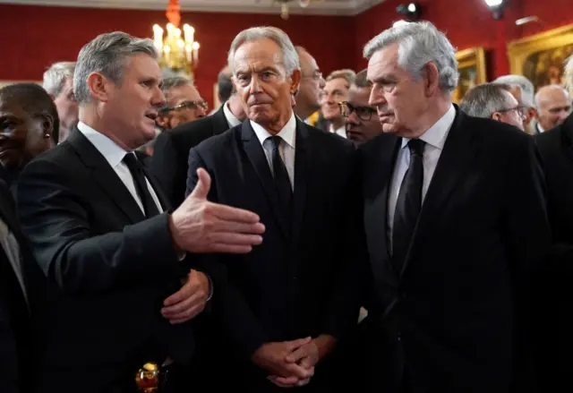 British Labour leader Keir Starmer, former Prime Ministers Tony Blair and Gordon Brown talk ahead of the Accession Council ceremony at St James's Palace in London on 10 September 2022