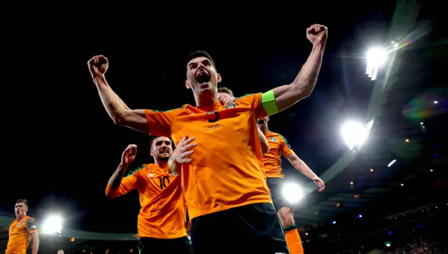 John Egan celebrates scoring the opener for the Republic against the Scots in Glasgow