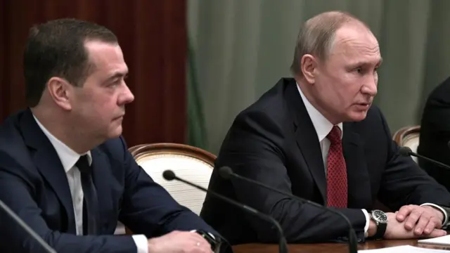 Russian President Vladimir Putin and former Prime Minister Dmitry Medvedev attend a meeting with members of the government in Moscow, Russia January 15, 2020