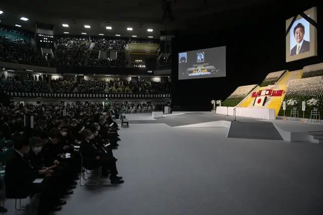 Attendants arrive at the state funeral of assassinated former Prime Minister of Japan Shinzo Abe at Nippon Budokan in Tokyo, Japan, 27 September 2022.