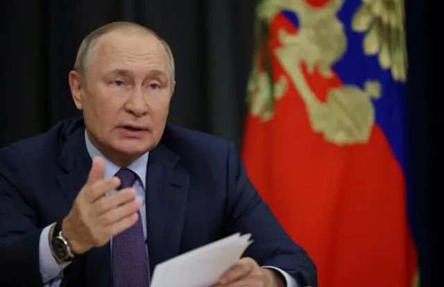 Russian President Vladimir Putin chairs a meeting via video link in Sochi, Russia September 27, 2022.