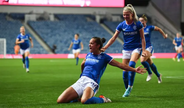 Kayla McCoy celebrates scoring for Rangers against Benfica