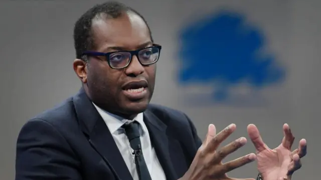 Chancellor Kwasi Kwarteng speaking during a conference